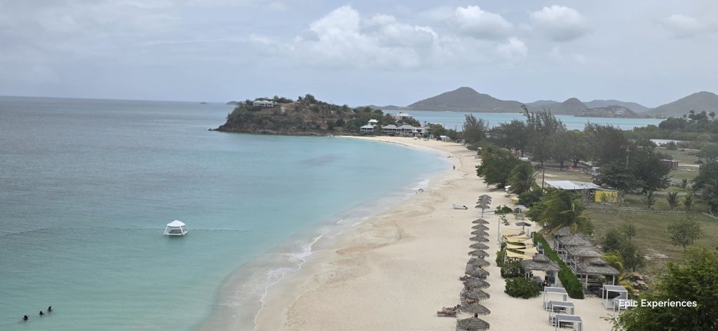 White sand and blue Caribbean sea at Tamarind Hills Resort, Antingua